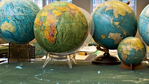 A collection of globes in the Evans Map Room, Baker-Berry Library